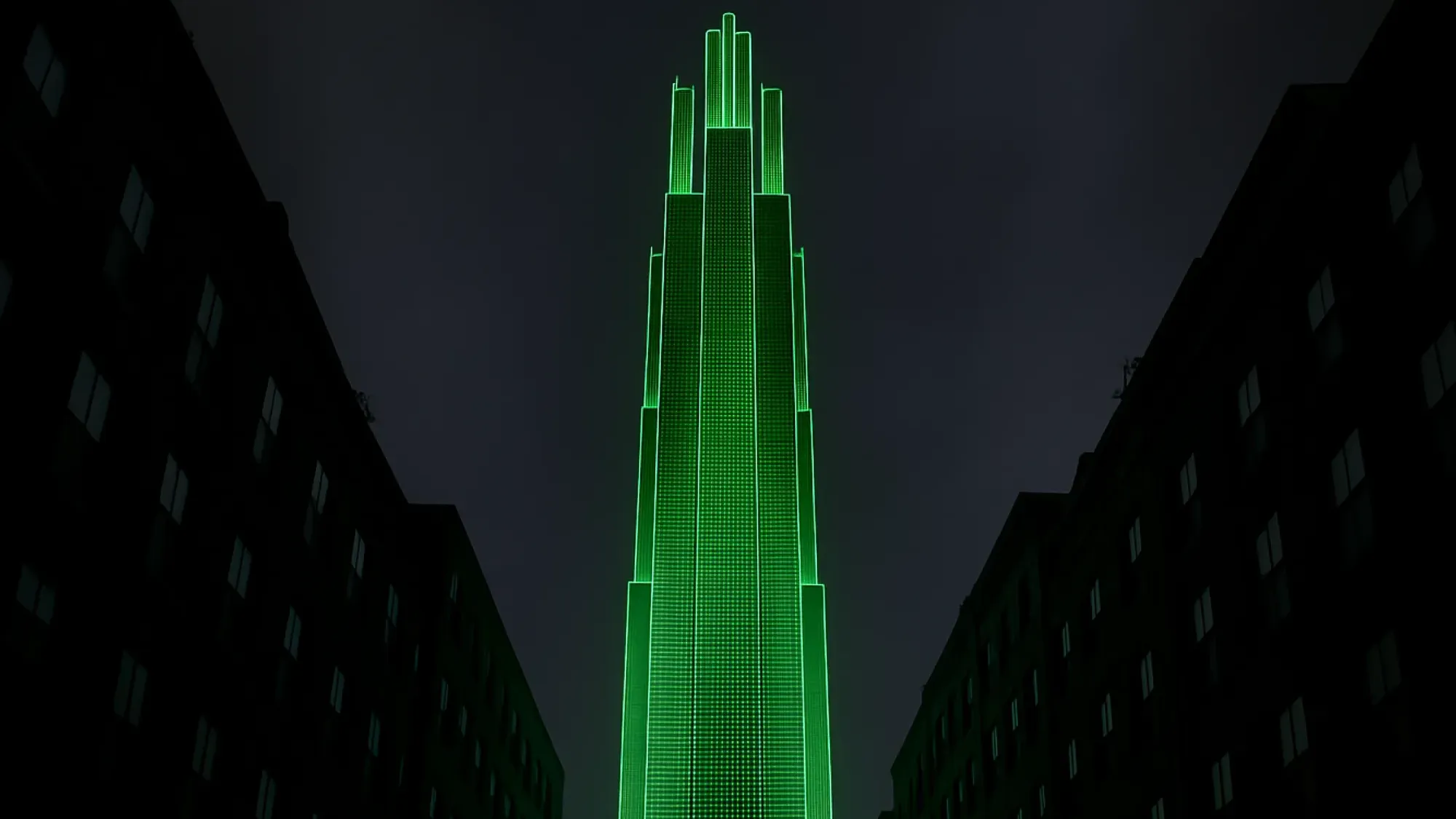 Dark night scene: a tall, tiered skyscraper outlined in vivid green light rises between shadowed mid-rise buildings under a cloudy sky.