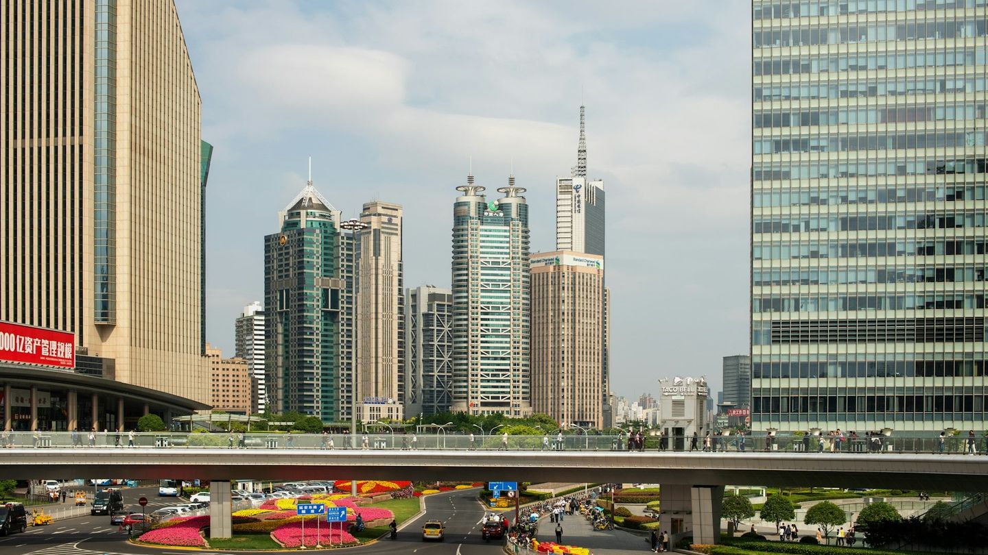 Modern financial district under bright sky