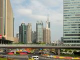 Modern financial district under bright sky